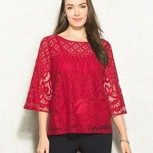 NWOT lace top with belled sleeves.